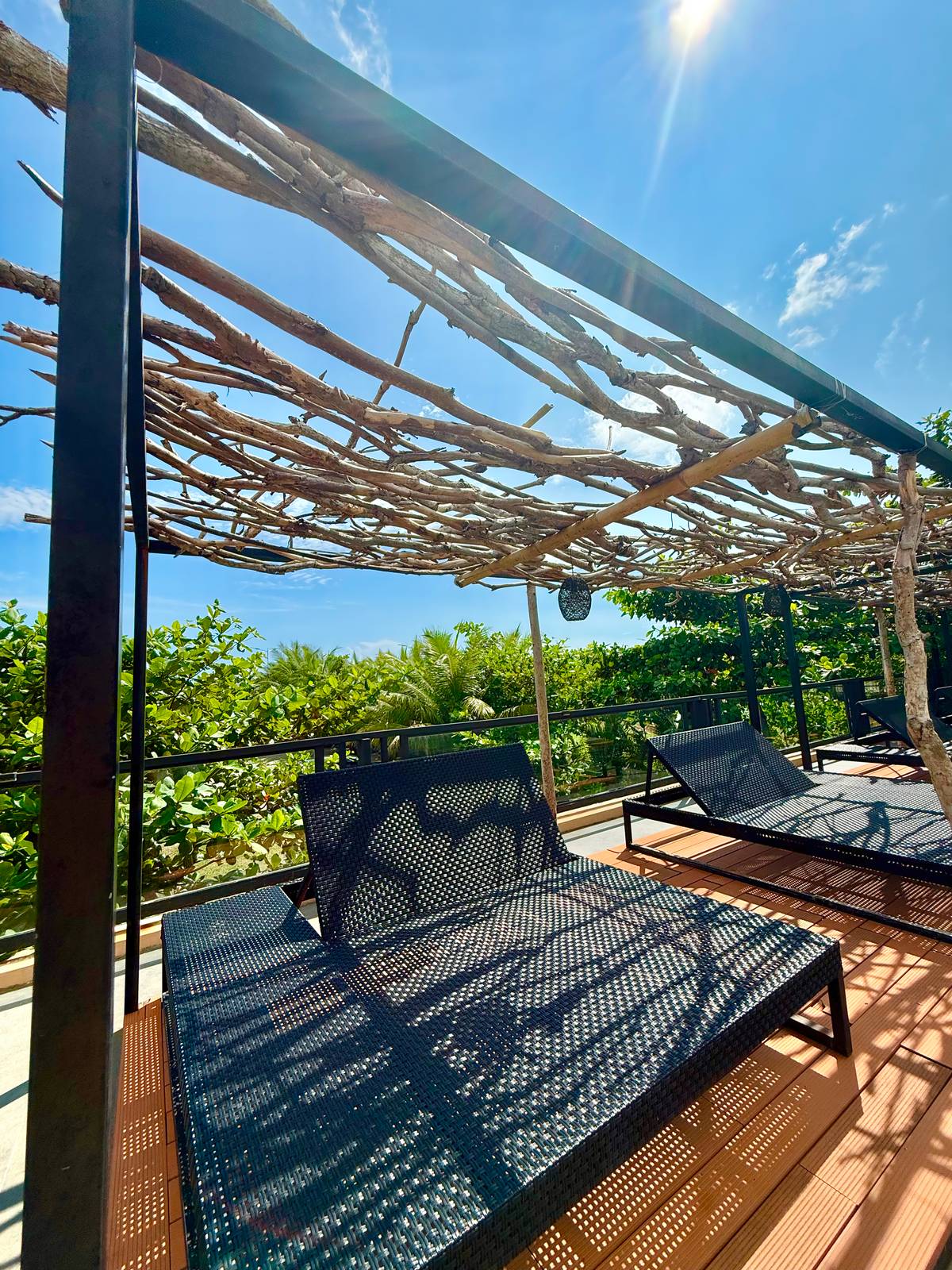 RATTAN and coco twigs are joined into a clean resting place that is cool and comfortable.