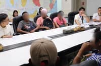 THE Filipino fishers from the China-flagged vessel FN Lu Qina Yuan Yu 108 are with officials from the Department of Migrant Workers following their involvement in a 17 September collision with a bulk carrier in the Strait of Singapore.