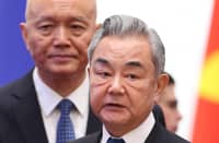 CHINESE officials Cai Qi and Wang Yi attend an SCO+ meeting in Bishkek.