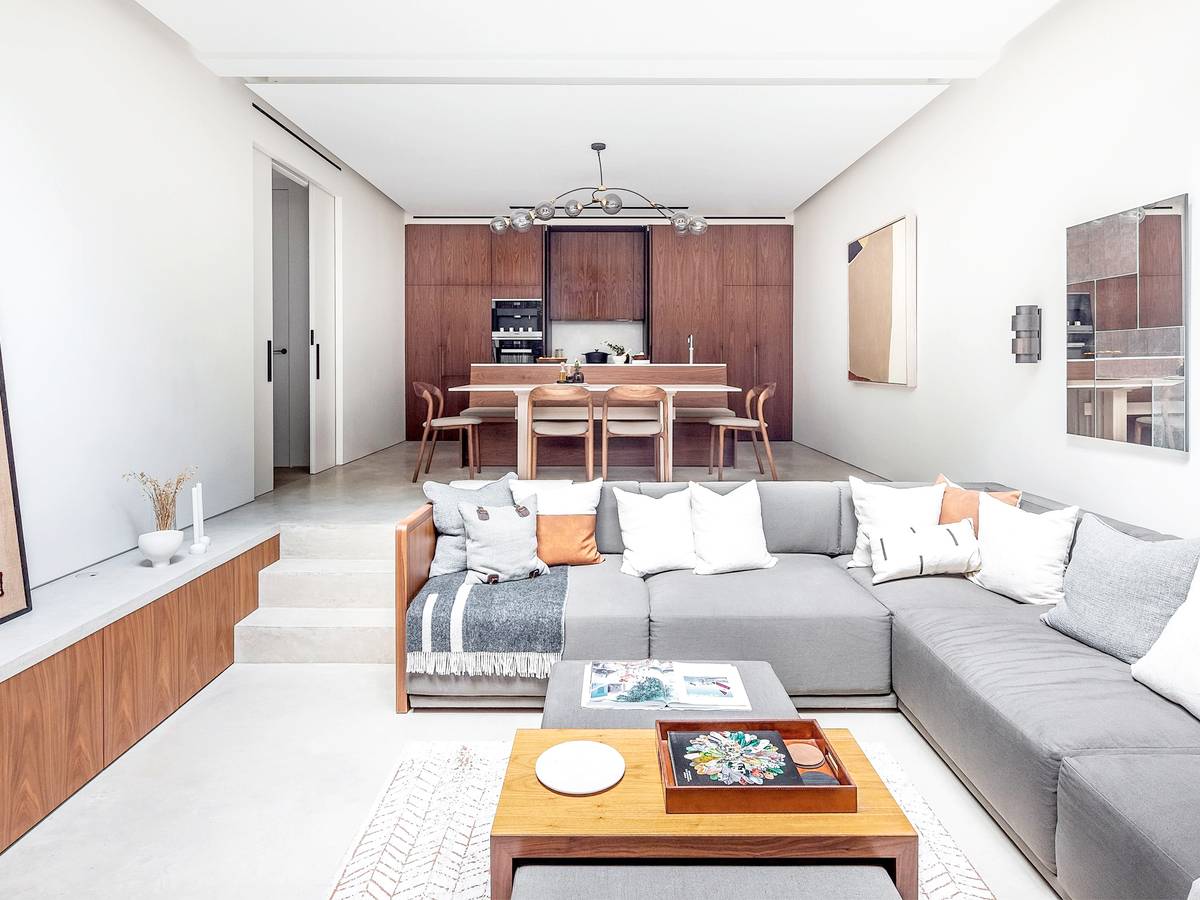 AN open living and dining area allows different parts of the household to use the same space for meals, conversations, work and gatherings.
