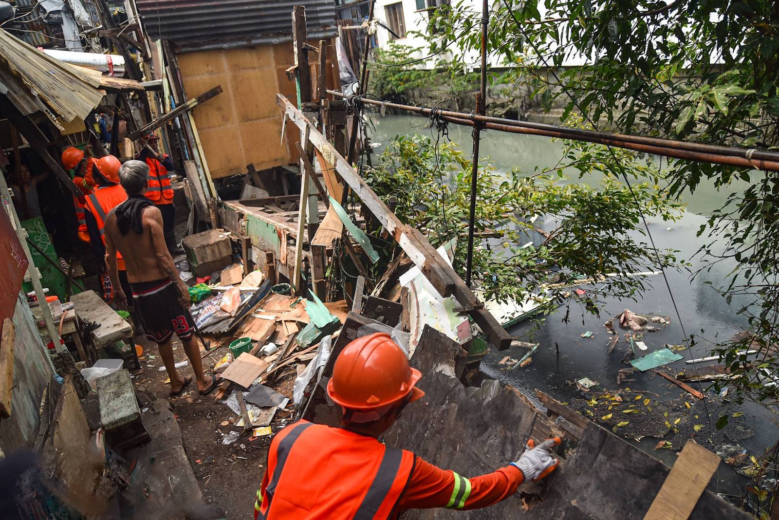 Homes of 49 families who live under the Osmeña Tunnel are demolished by personnel from the Department of Public Works and Highways (DPWH) in Malate, Manila, on September 30.

For years, the families made the space beneath the tunnel, extending to Barangays 738 and 799, their home, turning the cramped area into living spaces while carrying on with their livelihoods. The families will be relocated to San Ildefonso, Bulacan, where they face the challenge of adjusting to a new environment and lifestyle. | Zedrich Xylak Madrid