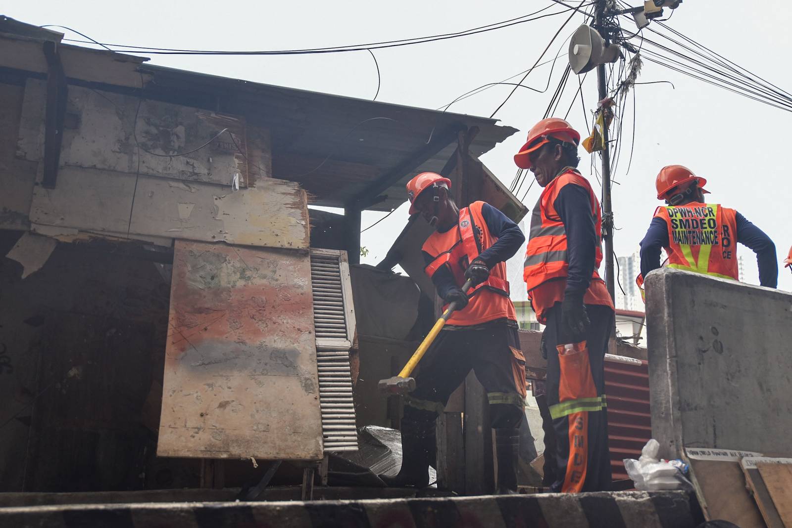 Homes of 49 families who live under the Osmeña Tunnel are demolished by personnel from the Department of Public Works and Highways (DPWH) in Malate, Manila, on September 30.

For years, the families made the space beneath the tunnel, extending to Barangays 738 and 799, their home, turning the cramped area into living spaces while carrying on with their livelihoods. The families will be relocated to San Ildefonso, Bulacan, where they face the challenge of adjusting to a new environment and lifestyle. | Zedrich Xylak Madrid