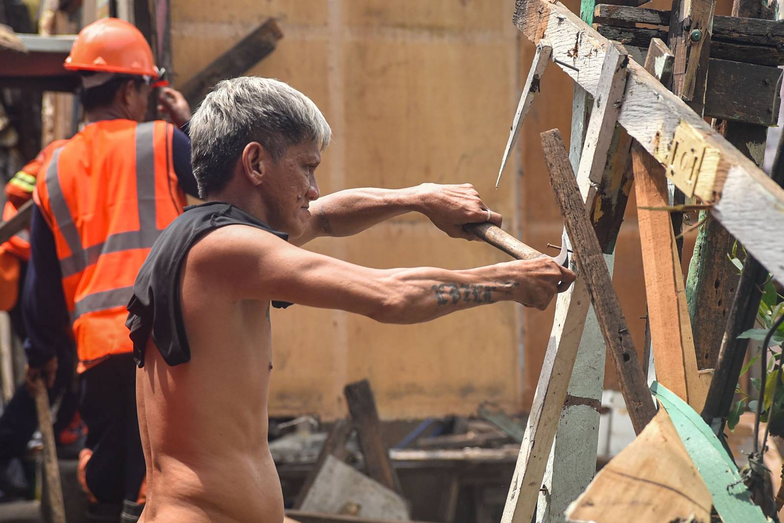 Homes of 49 families who live under the Osmeña Tunnel are demolished by personnel from the Department of Public Works and Highways (DPWH) in Malate, Manila, on September 30.

For years, the families made the space beneath the tunnel, extending to Barangays 738 and 799, their home, turning the cramped area into living spaces while carrying on with their livelihoods. The families will be relocated to San Ildefonso, Bulacan, where they face the challenge of adjusting to a new environment and lifestyle. | Zedrich Xylak Madrid
