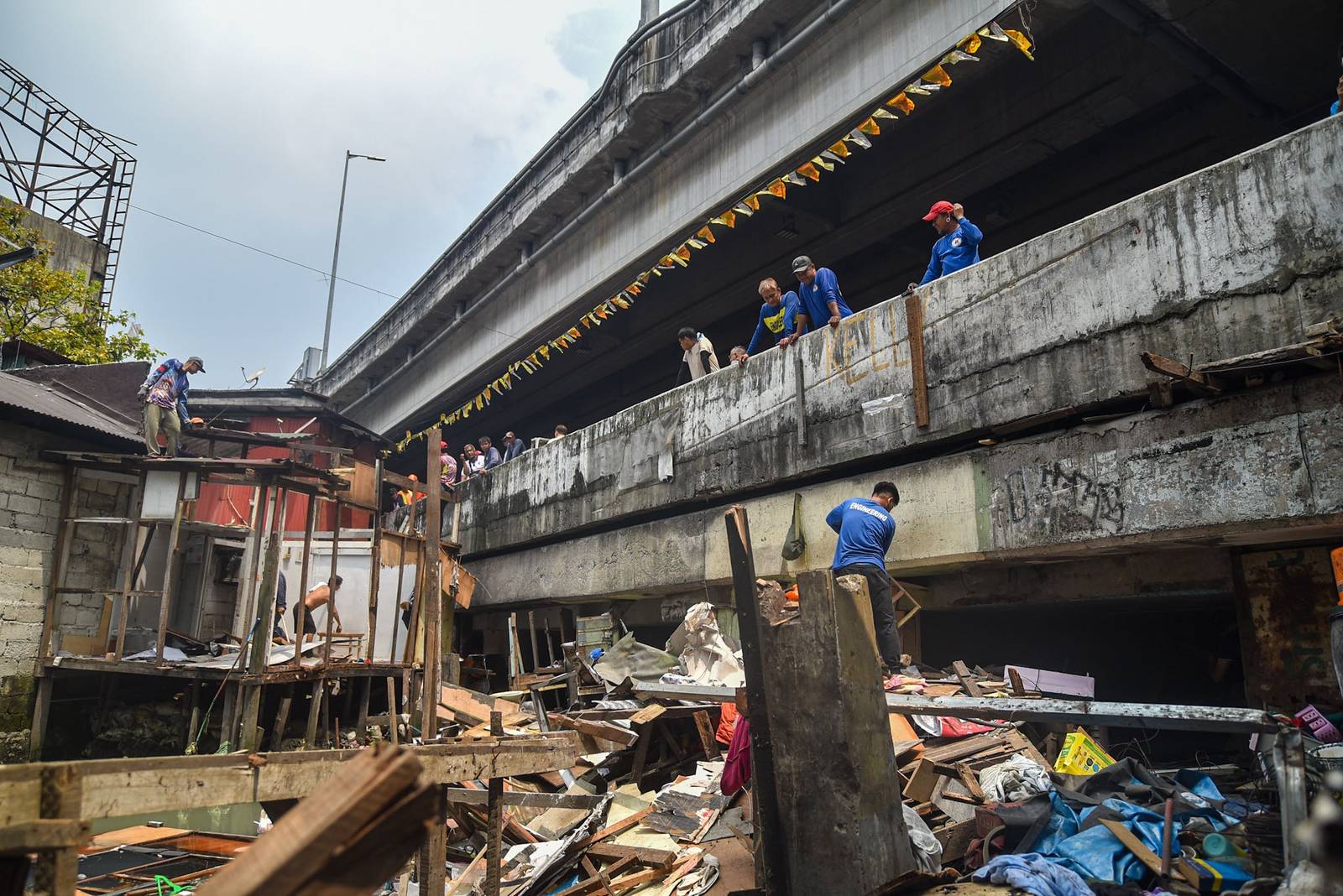 Homes of 49 families who live under the Osmeña Tunnel are demolished by personnel from the Department of Public Works and Highways (DPWH) in Malate, Manila, on September 30.

For years, the families made the space beneath the tunnel, extending to Barangays 738 and 799, their home, turning the cramped area into living spaces while carrying on with their livelihoods. The families will be relocated to San Ildefonso, Bulacan, where they face the challenge of adjusting to a new environment and lifestyle. | Zedrich Xylak Madrid