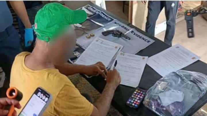 POLICE officers display an unlicensed firearm, ammunition, and approximately 25 grams of suspected shabu valued at P170,000 recovered during a search warrant operation in Purok Kagaykay, Barangay 2, Bacolod City.