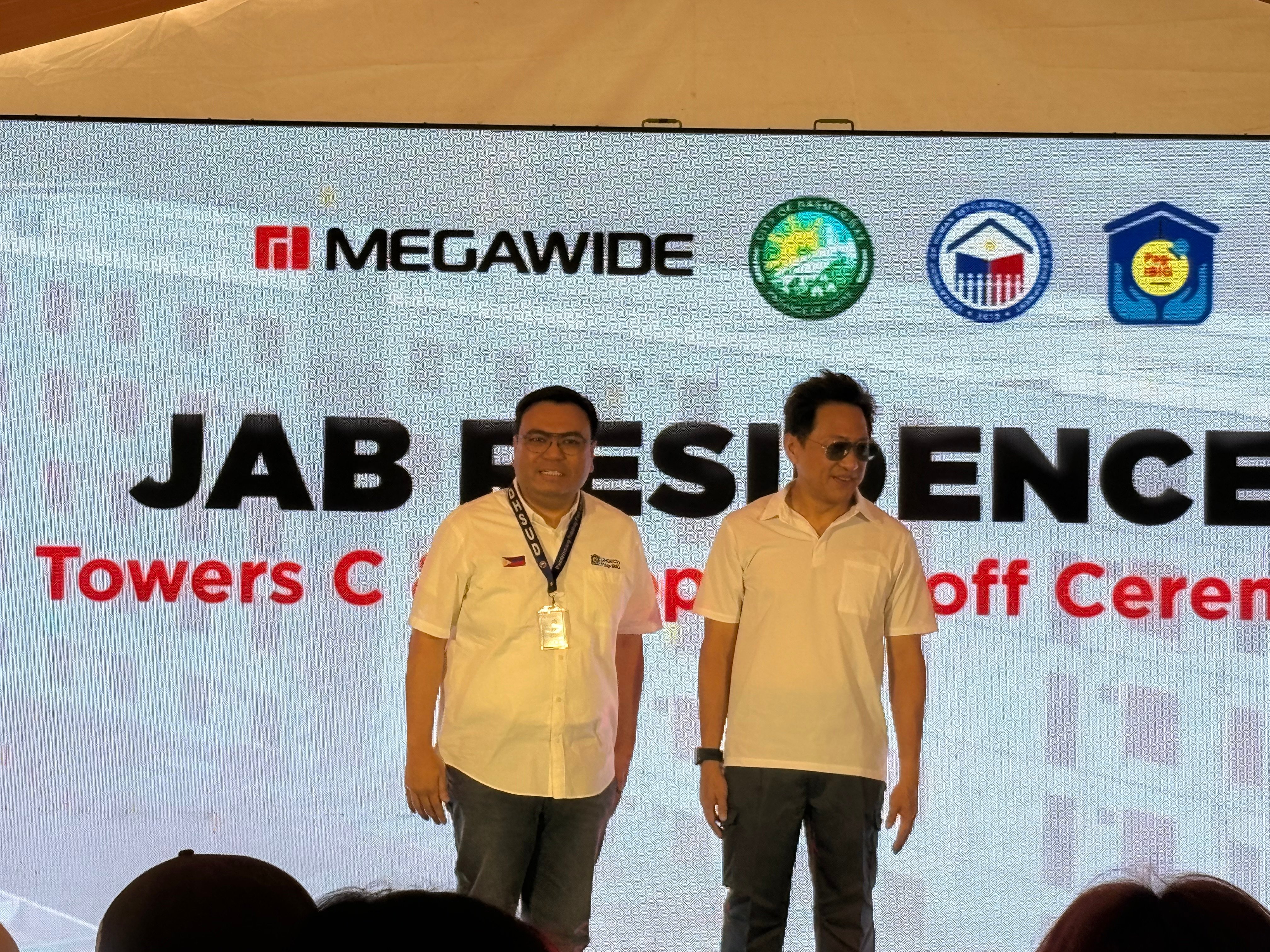 Megawide tops off two 4PH towers in Cavite