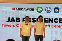 Megawide tops off two 4PH towers in Cavite