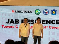 Megawide tops off two 4PH towers in Cavite