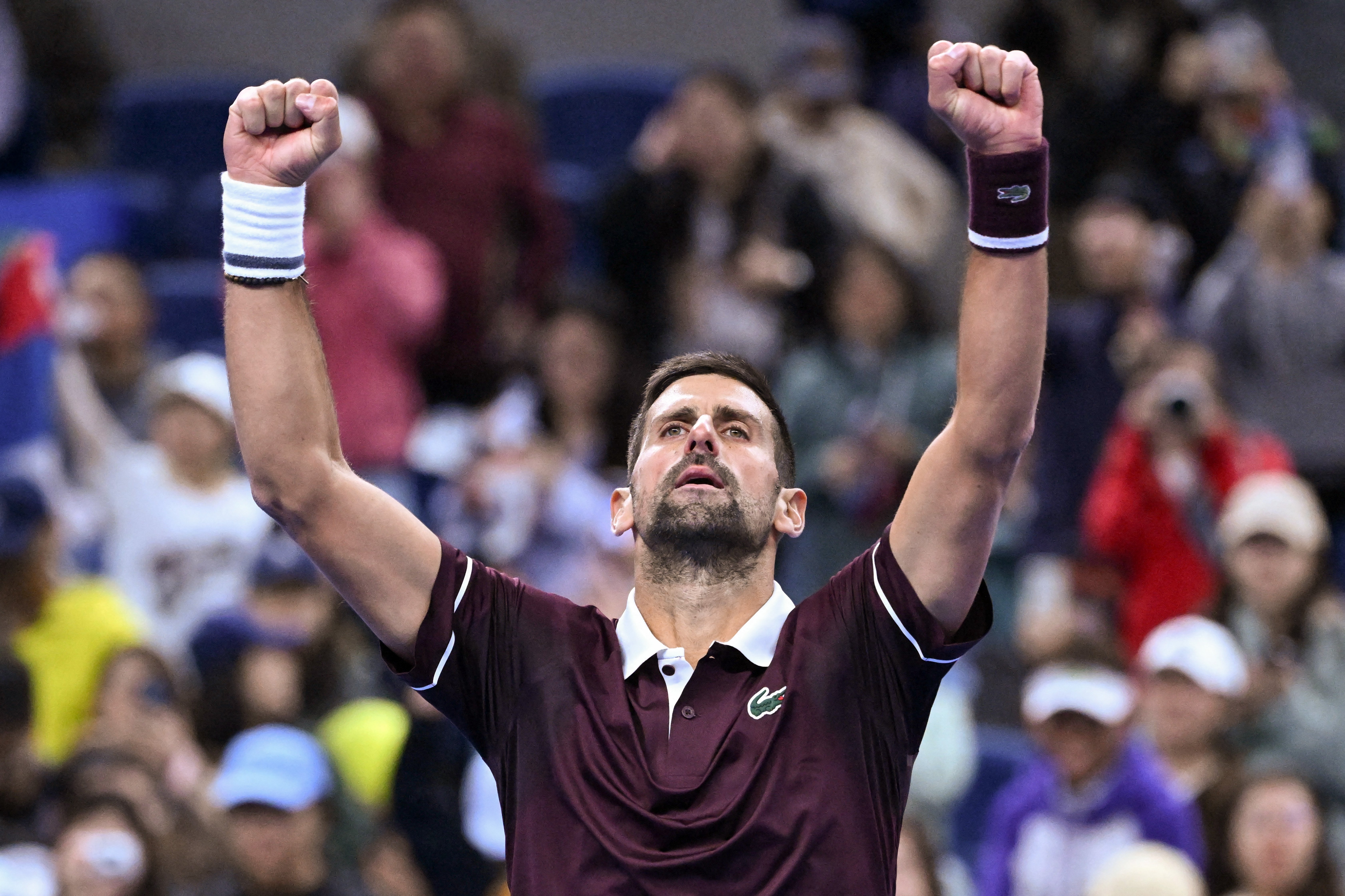 Novak survives Beijing opener 