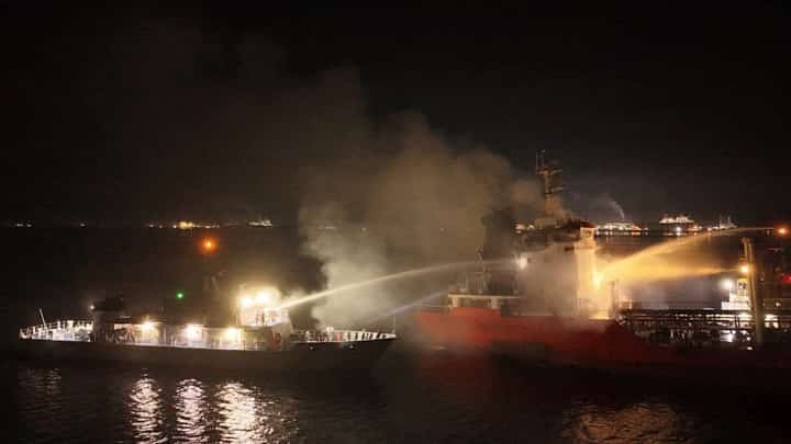 Firefighters and Philippine Coast Guard personnel respond to a fire aboard motor tanker Gindara at the Balayan Distillery jetty in Barangay Talisay, Calaca City, Batangas, on 30 September 2026.