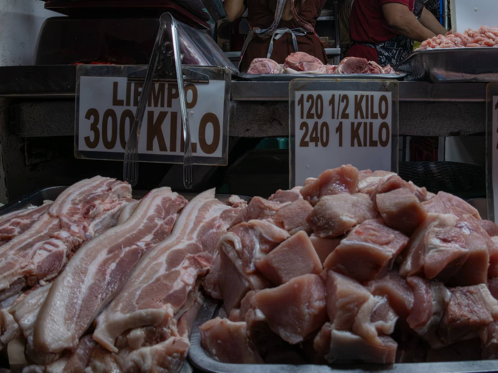 Pork cuts are displayed for sale at Paco Public Market in Manila on 02 October 2026. The Department of Agriculture is proposing higher pork import tariffs in 2027 as local hog production recovers and farmgate prices fall.