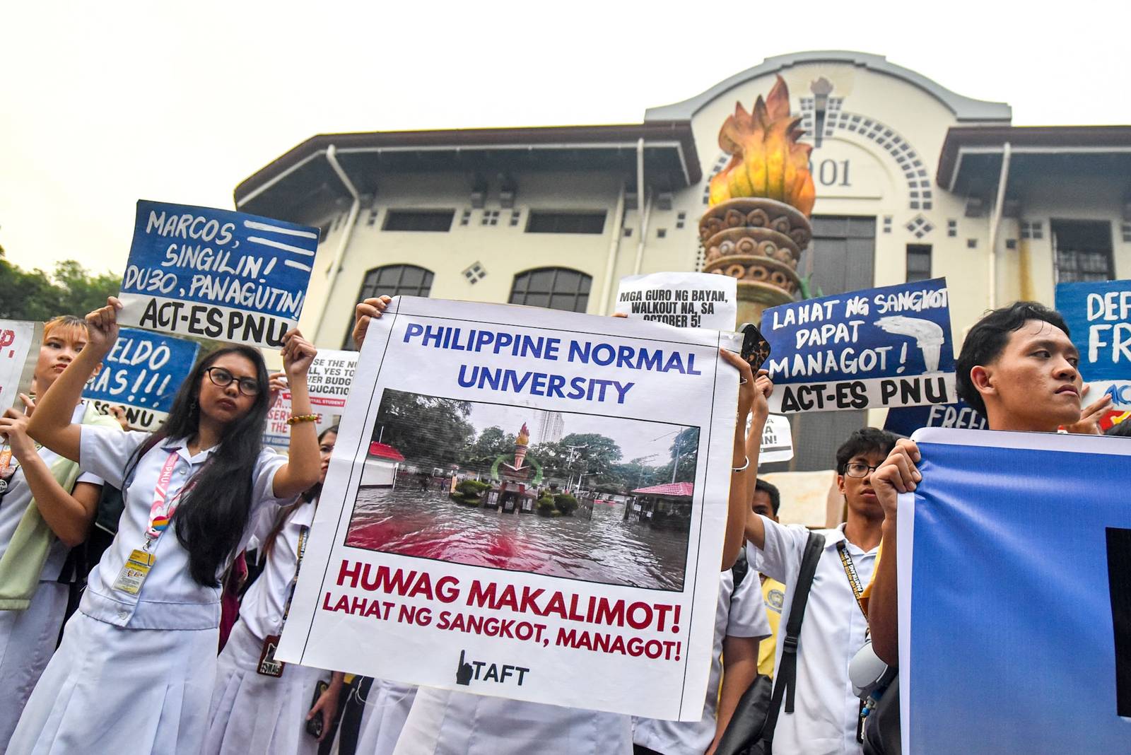 Student-teachers from progressive groups at the Philippine Normal University (PNU) call on the university administration and the Marcos Jr. government to provide livable wages for teachers and oppose budget cuts that they say affect student welfare during a protest in Manila on October 2.

The student-teachers are set to hold a walkout on October 5 in observance of World Teachers’ Day. l Zedrich Xylak Madrid