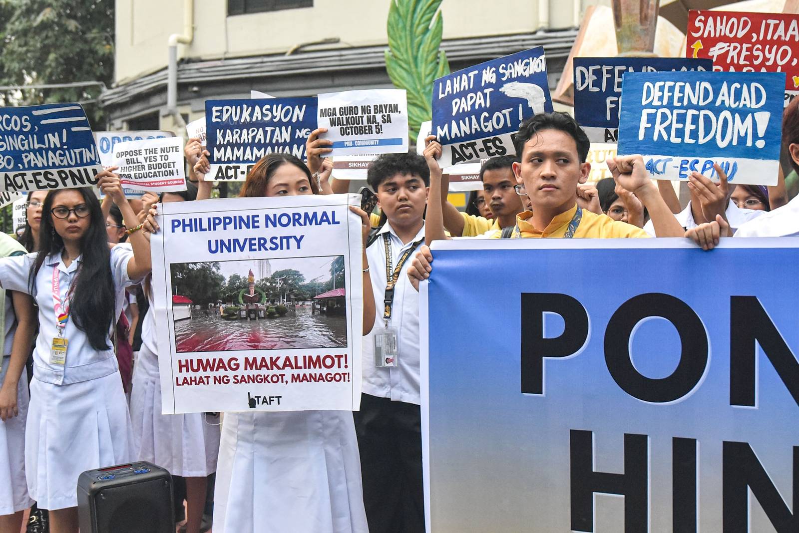 Student-teachers from progressive groups at the Philippine Normal University (PNU) call on the university administration and the Marcos Jr. government to provide livable wages for teachers and oppose budget cuts that they say affect student welfare during a protest in Manila on October 2.

The student-teachers are set to hold a walkout on October 5 in observance of World Teachers’ Day. l Zedrich Xylak Madrid