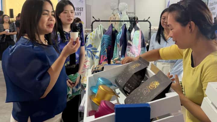 DENISE Sze, marketing lead of MAGWAI (right), together with Nerissa Buarao of the MAGWAI sales team (left) and Van Thi Loan, founder of Real Bean Coffee (center), showcase their products — sustainable personal care products and Vietnamese coffee — to visitors at the MSME Summit.