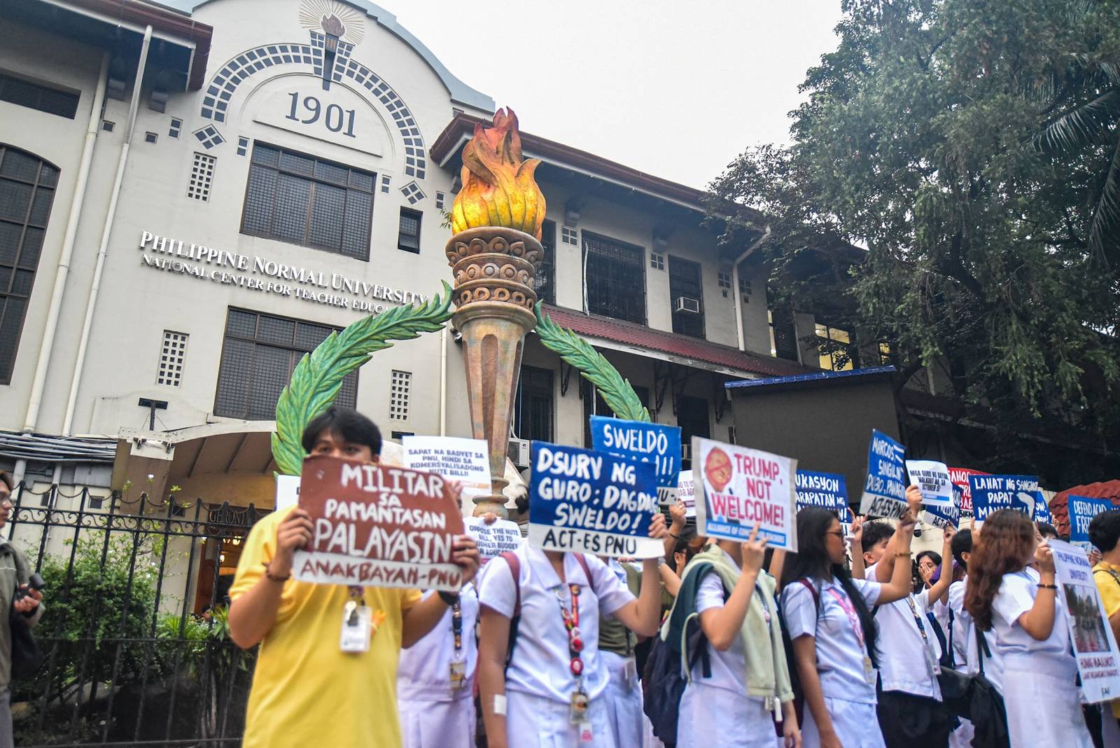 Student-teachers from progressive groups at the Philippine Normal University (PNU) call on the university administration and the Marcos Jr. government to provide livable wages for teachers and oppose budget cuts that they say affect student welfare during a protest in Manila on October 2.

The student-teachers are set to hold a walkout on October 5 in observance of World Teachers’ Day. l Zedrich Xylak Madrid
