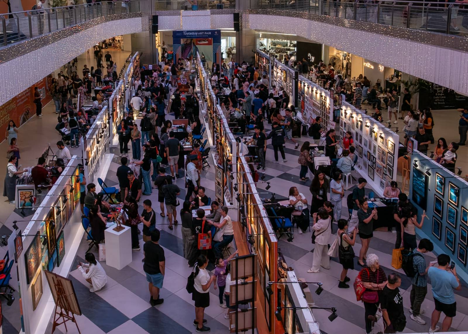 Art enthusiasts, mall-goers and artists converge at the Gateway Art Fair at Gateway Mall 2 in Quezon City on 03 October 2026. Now in its fifth edition, the four-day fair features more than 200 Filipino artists and art groups showcasing paintings, sculptures, installations and other visual artworks, along with workshops and talks aimed at making art more accessible to the public.