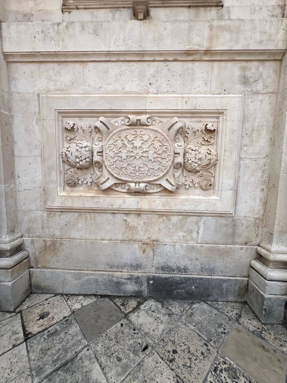 A BAS-relief embellishment along a House of Prayer.