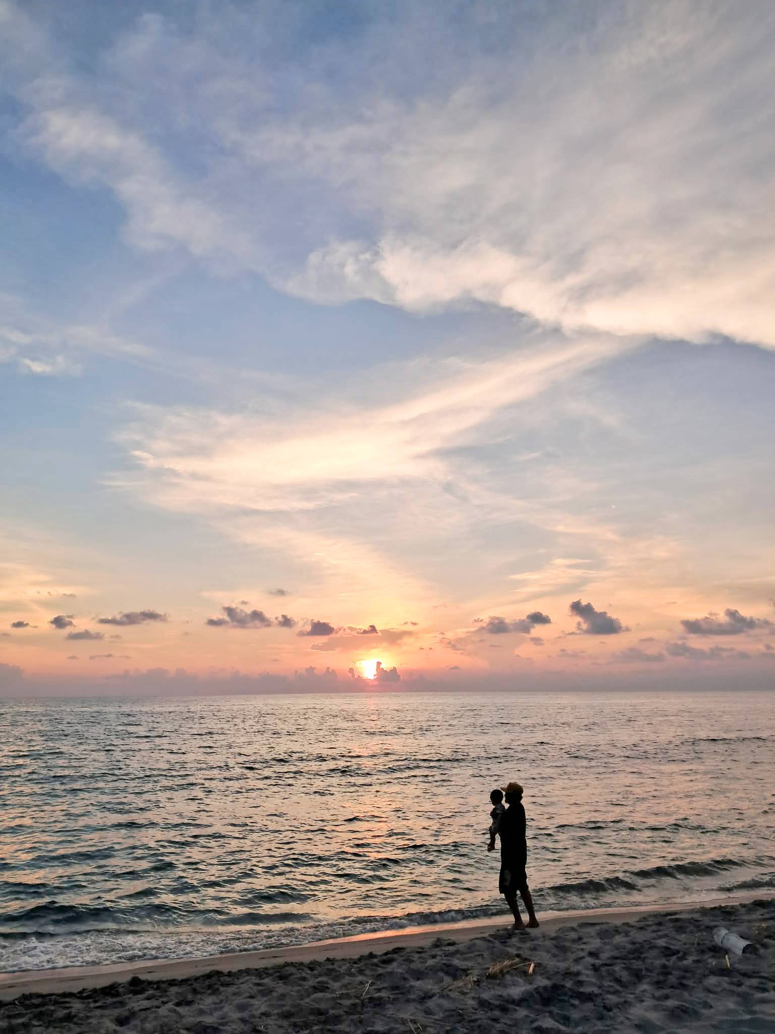 CHESTER Felix Sarmiento and son Isaiah savor the enthralling sunset at Cabangan beach.