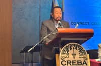 CREBA National President Noel Toti Cariño during a discussion on housing regulations, project delivery and industry concerns.