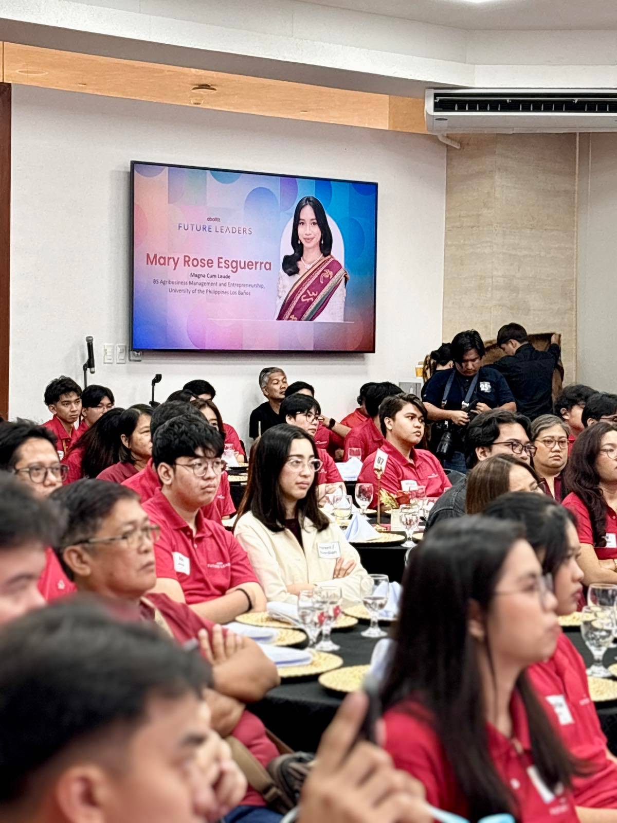 SCHOLARS listen as Mary Rose Esguerra speaks.