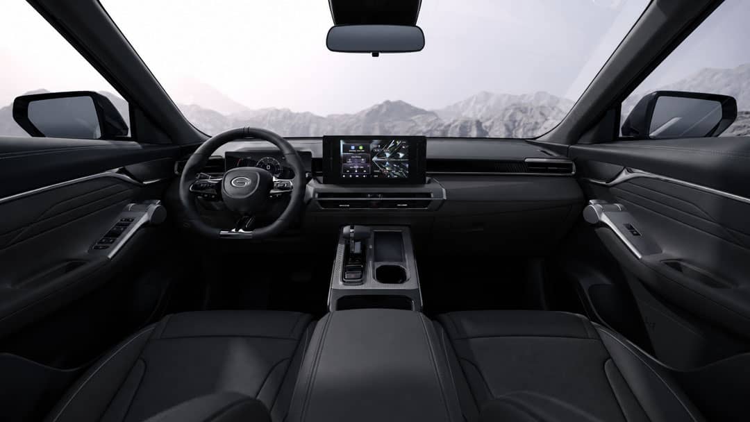 CABIN features of the GAC GS4 Max HEV include a central touchscreen, wireless phone charging and a black interior.