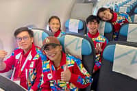 MEDALISTS Carlo Paalam of boxing (front row, right), Jeus Yape (second row, right), Tachiana Mangin (second row, left) and Juliana Candelaria (third row) of taekwondo are part of the last batch of Filipino athletes who flew out of Nagoya following a successful stint in the 20th Asian Games. Also shown is POC officer Raymund Flores.