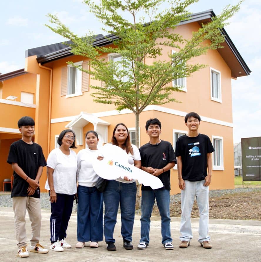 THE five siblings and their grandmother gather outside their new residence in Camella Palawan, celebrating a permanent place to call home and a new chapter together.