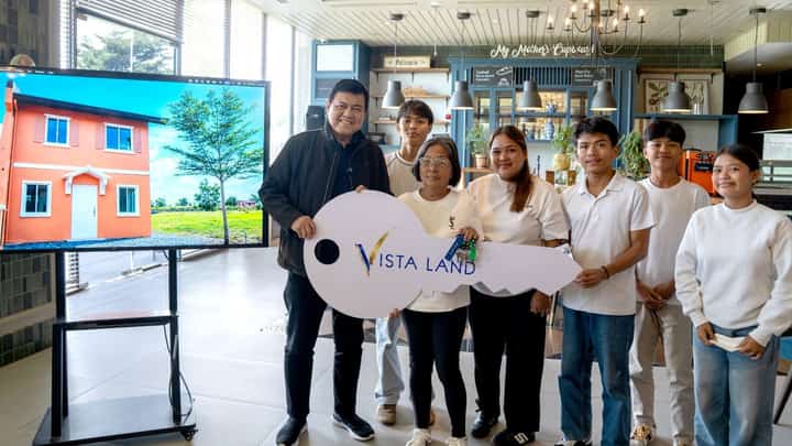VILLAR Group chairman Manny Villar hands over the symbolic key to a new home to the five children of the late OFW Baby Jane Teodoro Allas and their grandmother. The house and lot, donated through Vista Land, gives the siblings a secure home following the loss of their mother, who worked in Hong Kong to provide for her family.