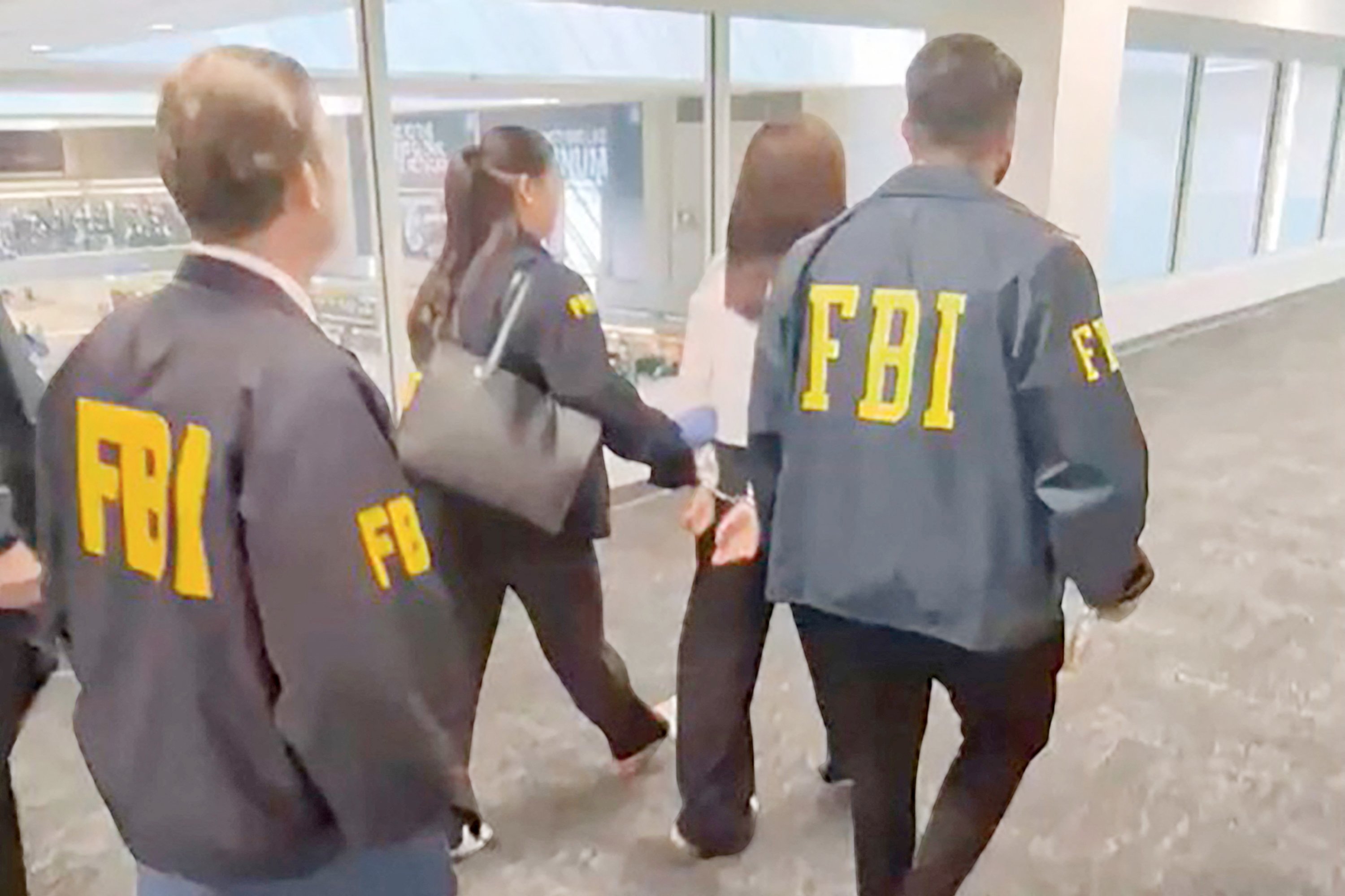 U.S. arrests woman allegedly spying on Taiwan leader’s family