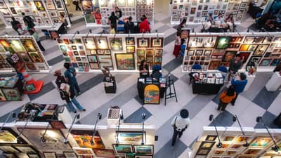 VISITORS browse artworks and interact with participating artists during the fifth Gateway Art Fair.