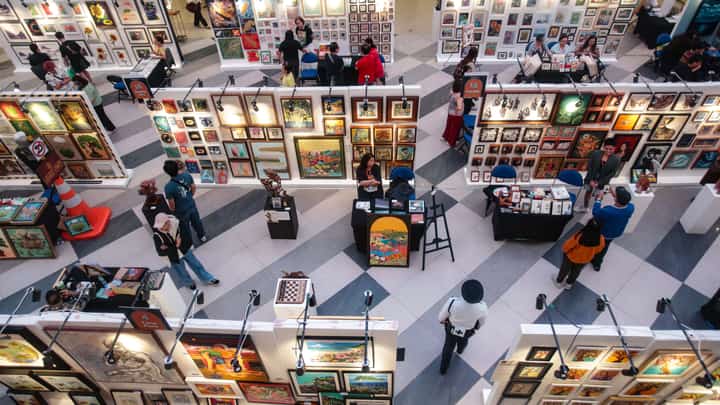 VISITORS browse artworks and interact with participating artists during the fifth Gateway Art Fair.