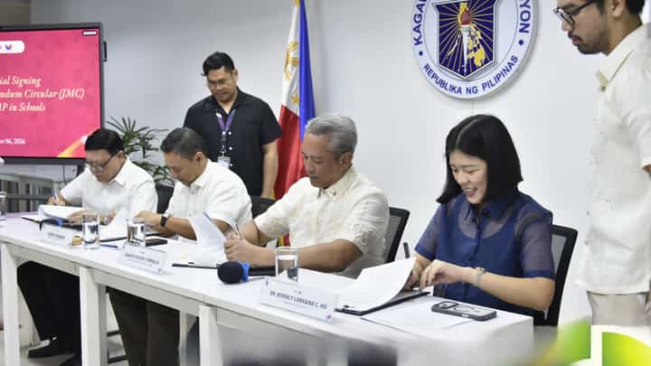 HEALTH Secretary Edwin M. Mercado (from left), Education Secretary Juan Edgardo Angara, Interior Secretary Juanito Victor Remulla and PhilHealth acting president and CEO Beverly Lorraine C. Ho sign a Joint Memorandum Circular launching the YAKAP School Health and Protection Program on Tuesday.