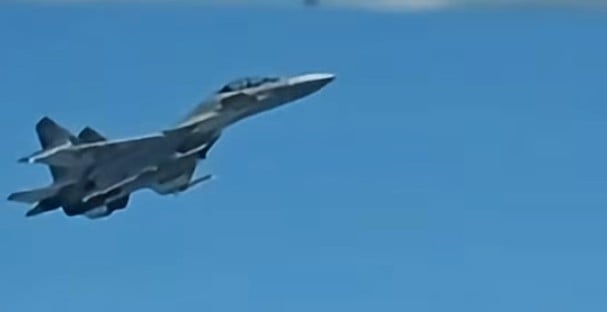 AFP cites dangerous jet intercept, Chinese ship surge