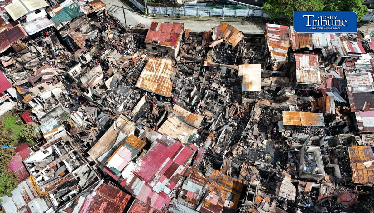 (October 07 2026) Fire victims at Waling Waling, in Brgy. Central, Quezon City on Wednesday October 7 2026, savage reusable materials lifted from the fifth alarm fire that hit in the area on Tuesday. Photo/Analy Labor