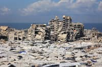 TEMPORARY tents of displaced Palestinians is pictured along destroyed buildings in Gaza City on 7 October 2026. Israel carried out new strikes in Gaza as it marked the third anniversary of the 2023 attacks by Hamas, with Palestinian officials reporting two dead.