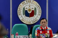 SENATOR Christopher ‘Bong’ Go listens to the explanation of PNVF executive director Miguel Carlos Suarez during the Senate hearing on the issues surrounding the 20th Asian Games on Thursday.