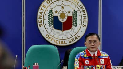 SENATOR Christopher ‘Bong’ Go listens to the explanation of PNVF executive director Miguel Carlos Suarez during the Senate hearing on the issues surrounding the 20th Asian Games on Thursday.