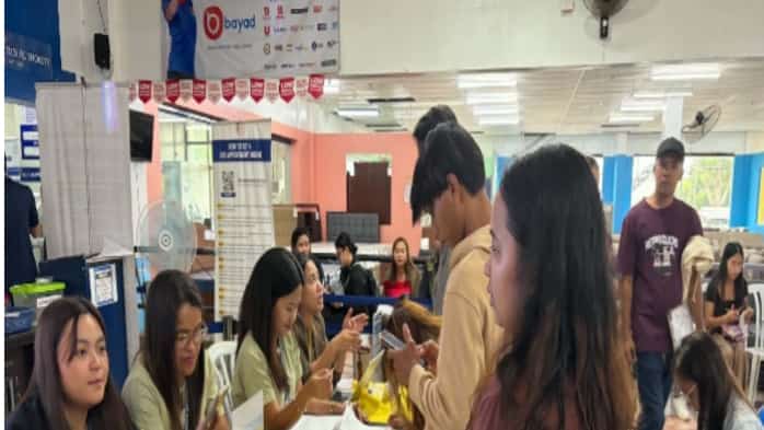 Visitors inquire about PSA services at information booths during an open house event in Lipa City, Batangas.
