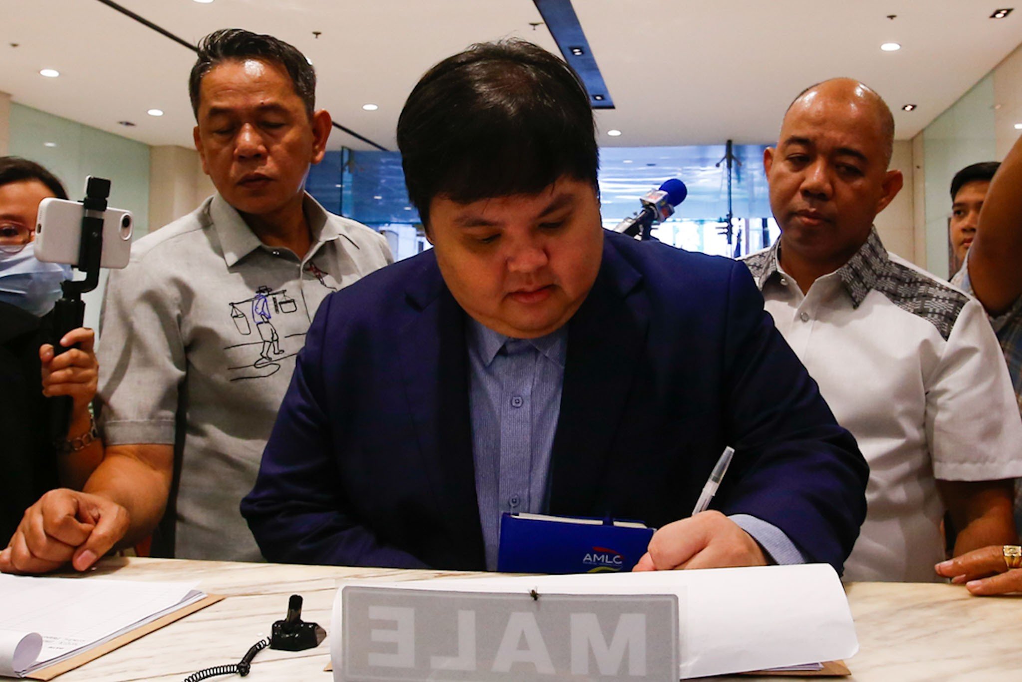 AMLC Executive Director arrives at the NBI