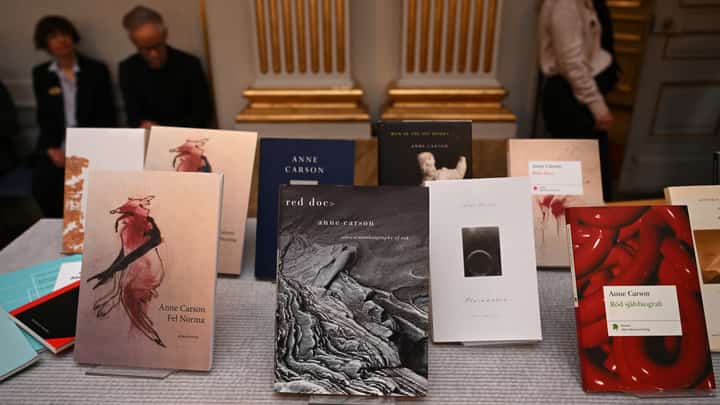 Copies of books by Canadian author Anne Carson are on display at the Swedish Academy in Stockholm, Sweden, after a press conference on October 8, 2026 to announce her as the winner of the 2026 Nobel Prize in Literature. The Nobel Prize in Literature was awarded to Canadian poet Anne Carson, an essayist and classicist who brings a modern twist to mysticism and antiquity in her writings about love, desire and despair. The 76-year-old was honoured "for her bold and inventive oeuvre that, in playful dialogue with the classical tradition, has created new forms for contemporary literature," the Swedish Academy said.