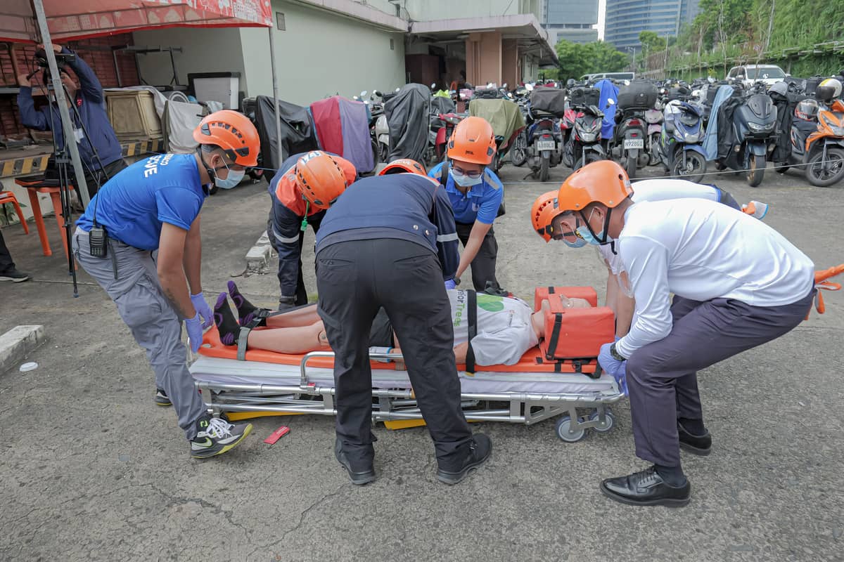 MERALCO Rescue with trained Security personnel rescued a patient (dummy victim) from a collapsed structure, as part of the quake drill.