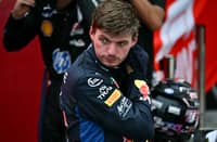 Red Bull Racing's Dutch driver Max Verstappen looks on after winning the sprint race ahead of the Formula One Singapore Grand Prix at the Marina Bay Street Circuit in Singapore on October 10, 2026.