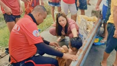 Rescued children receive immediate medical assistance following the Abacan River incident in Barangay Anunas, Angeles City, on 8 October. Authorities continue to remind the public to avoid river activities for their safety.