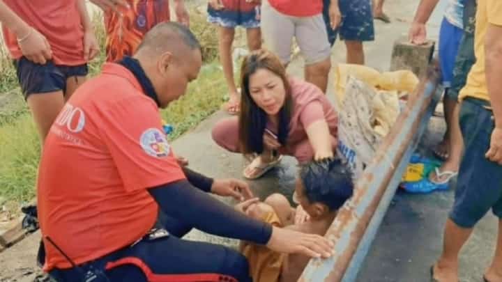 Rescued children receive immediate medical assistance following the Abacan River incident in Barangay Anunas, Angeles City, on 8 October. Authorities continue to remind the public to avoid river activities for their safety.