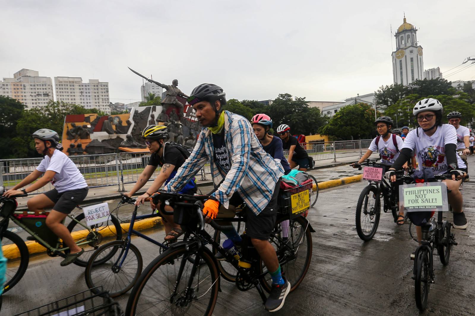 Cyclists, environmental advocates and youth organizations gather at Kartilya ng Katipunan in Manila on 11 October 2026, marking the end of their 17-kilometer “Padyak Kontra Pax Silica” protest ride. The group warned that the US-led initiative threatens the environment, risks displacing Indigenous communities and undermines national sovereignty.