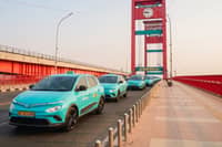 ELECTRIC taxis from Green SM cross Palembang’s Ampera Bridge as the company expands its service to a second city in Sumatra, Indonesia.