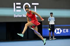 Zheng makes history, captures China Open title