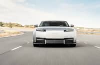 FRONT-END design of the Jaguar Type 01 features slim LED headlights and a wide, upright grille as the electric grand tourer undergoes road testing.