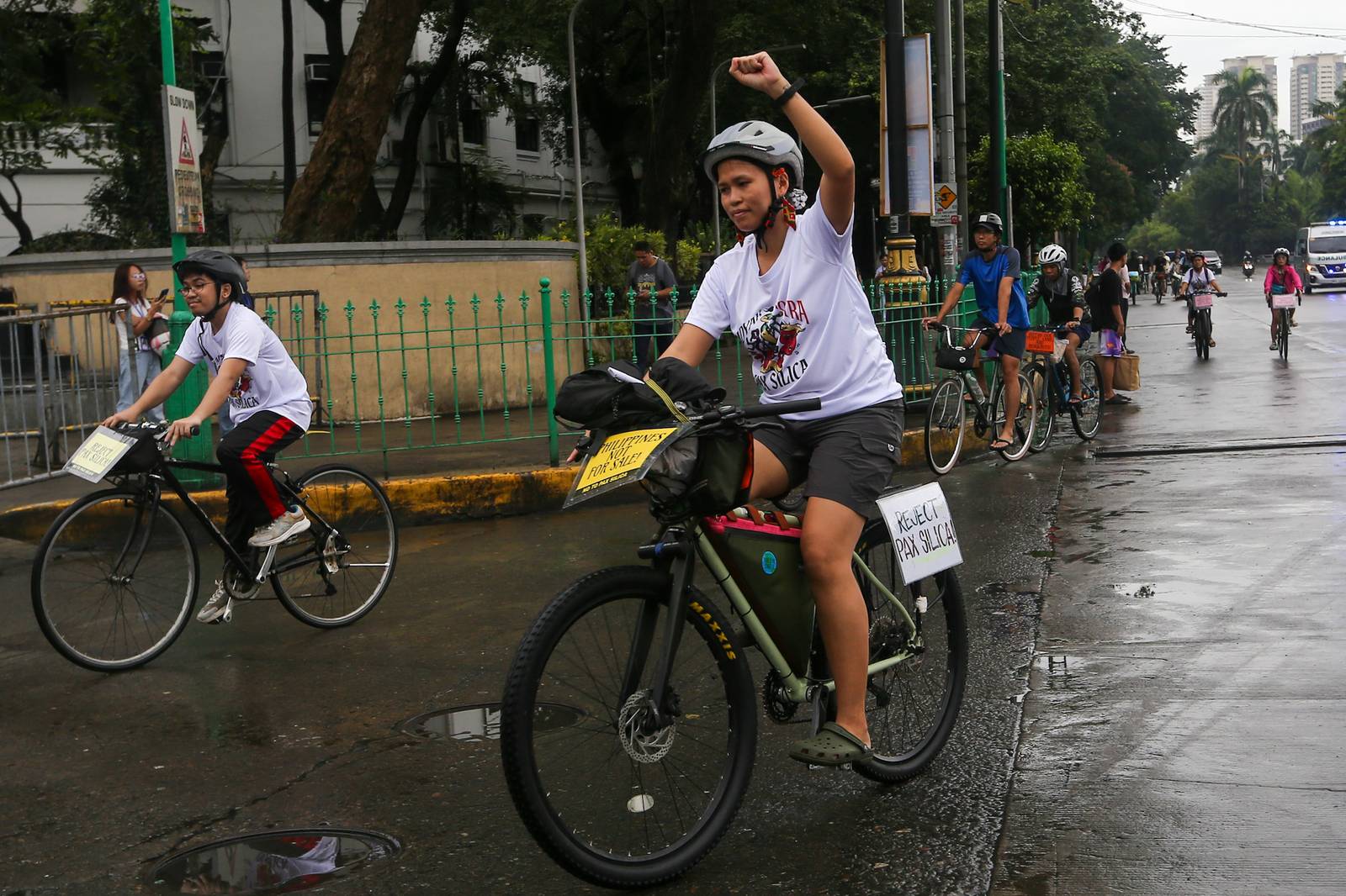 Cyclists, environmental advocates and youth organizations gather at Kartilya ng Katipunan in Manila on 11 October 2026, marking the end of their 17-kilometer “Padyak Kontra Pax Silica” protest ride. The group warned that the US-led initiative threatens the environment, risks displacing Indigenous communities and undermines national sovereignty.