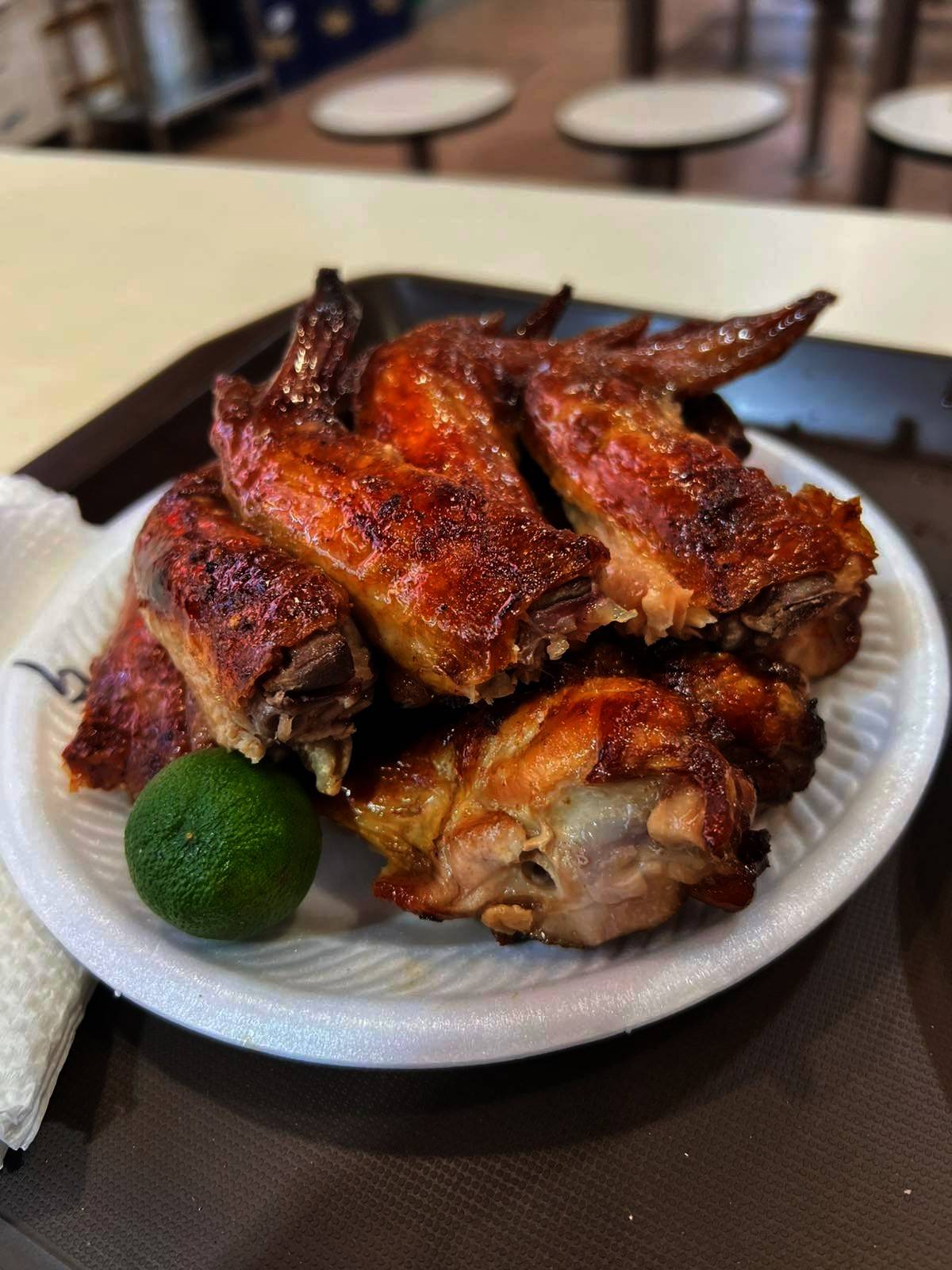 GRILLED chicken wings at Newton Food Centre has been a favorite order for tourists and locals in Singapore.